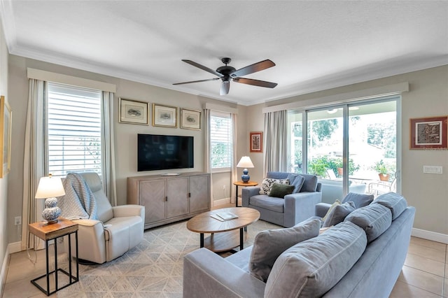 4717 Osprey Ridge Cir, Palm Harbor, FL 34684 - living room with ceiling fan, crown molding, and light tile patterned flooring