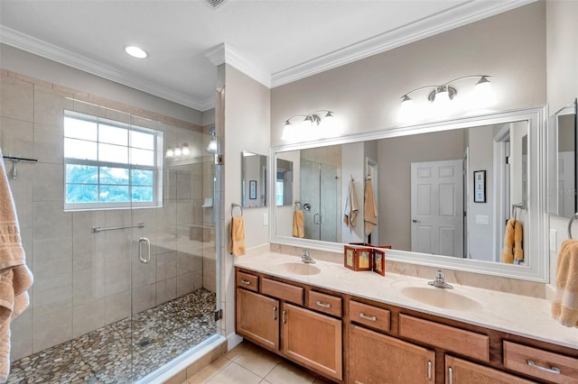 4717 Osprey Ridge Cir, Palm Harbor, FL 34684 - bathroom featuring double vanity, a stall shower, tile patterned floors, and ornamental molding