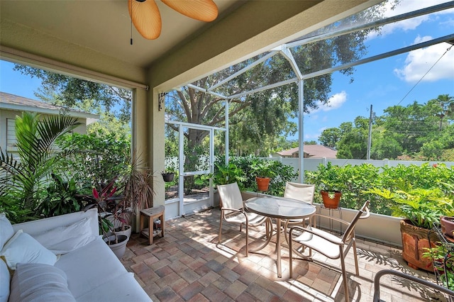 4717 Osprey Ridge Cir, Palm Harbor, FL 34684 - sunroom / solarium with a ceiling fan