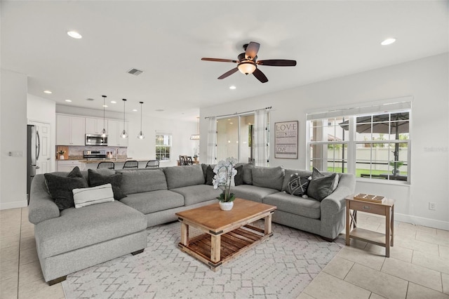 1844 Odiorne Point Ln, Wesley Chapel, FL 33543 - living room featuring ceiling fan, recessed lighting, baseboards, and light tile patterned flooring