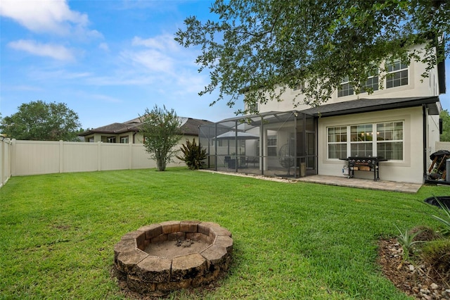 1844 Odiorne Point Ln, Wesley Chapel, FL 33543 - view of yard featuring a lanai, an outdoor fire pit, and a patio area