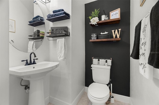1844 Odiorne Point Ln, Wesley Chapel, FL 33543 - half bath with toilet, baseboards, and tile patterned floors