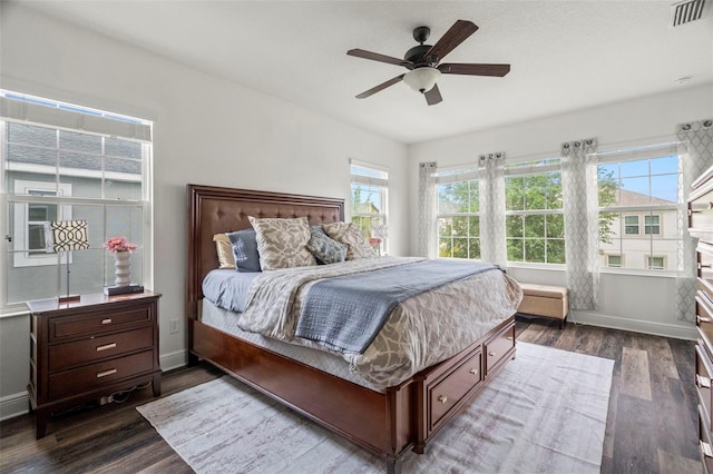 1844 Odiorne Point Ln, Wesley Chapel, FL 33543 - bedroom featuring dark wood-type flooring, baseboards, and ceiling fan