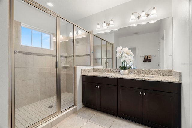1844 Odiorne Point Ln, Wesley Chapel, FL 33543 - bathroom with a stall shower, tile patterned floors, and double vanity