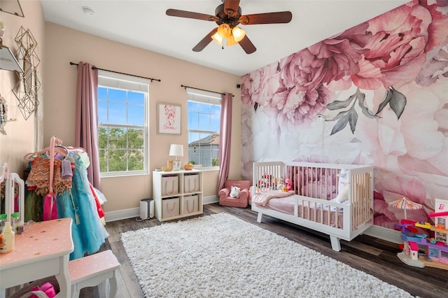 1844 Odiorne Point Ln, Wesley Chapel, FL 33543 - bedroom featuring wood finished floors, baseboards, and ceiling fan