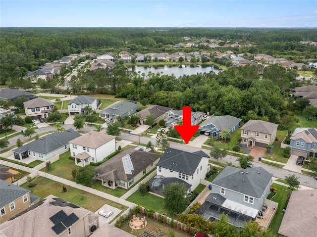 1844 Odiorne Point Ln, Wesley Chapel, FL 33543 - aerial view of residential area with a nearby body of water and a heavily wooded area