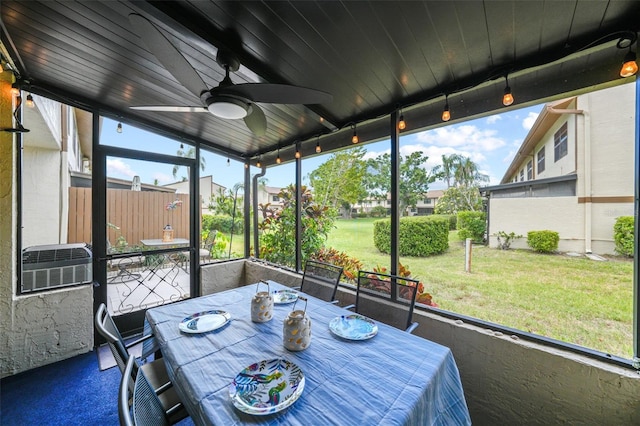 9209 Seminole Blvd Unit 156, Seminole, FL 33772 - sunroom with a ceiling fan and outdoor dining space