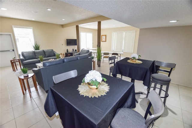 9209 Seminole Blvd Unit 156, Seminole, FL 33772 - dining space with a textured ceiling, healthy amount of natural light, light tile patterned floors, and recessed lighting