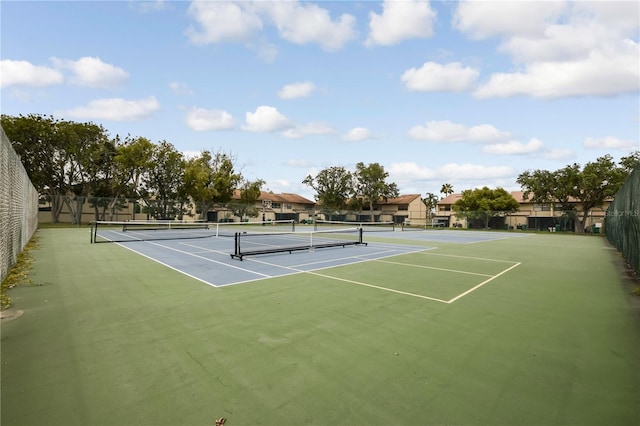 9209 Seminole Blvd Unit 156, Seminole, FL 33772 - view of tennis court featuring community basketball court