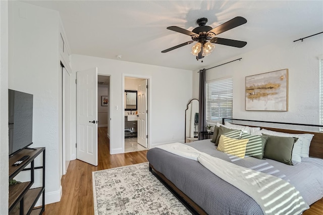 1145 53rd Ave N Unit 1, Saint Petersburg, FL 33703 - bedroom featuring wood finished floors, baseboards, ceiling fan, and a closet