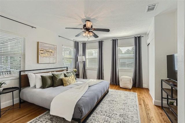1145 53rd Ave N Unit 1, Saint Petersburg, FL 33703 - bedroom featuring light wood-style floors, baseboards, and a ceiling fan