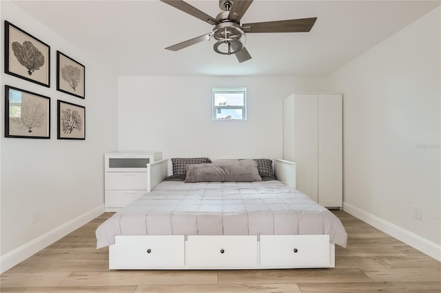 1145 53rd Ave N Unit 1, Saint Petersburg, FL 33703 - bedroom with light wood-style floors, baseboards, and ceiling fan