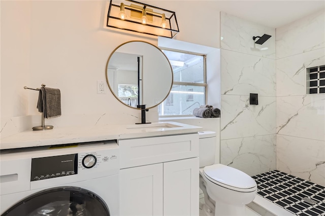 1145 53rd Ave N Unit 1, Saint Petersburg, FL 33703 - full bathroom with washer / dryer, a marble finish shower, toilet, and vanity