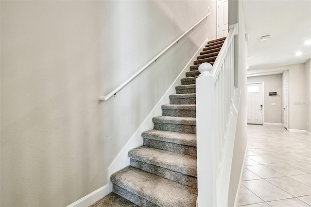 6745 Citrus Creek Ln, Tampa, FL 33625 - stairs with tile patterned flooring and baseboards