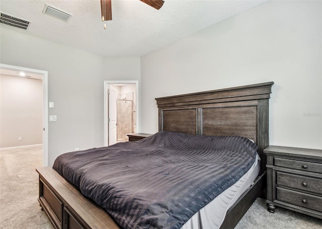 6745 Citrus Creek Ln, Tampa, FL 33625 - bedroom featuring light colored carpet, ceiling fan, ensuite bath, and baseboards
