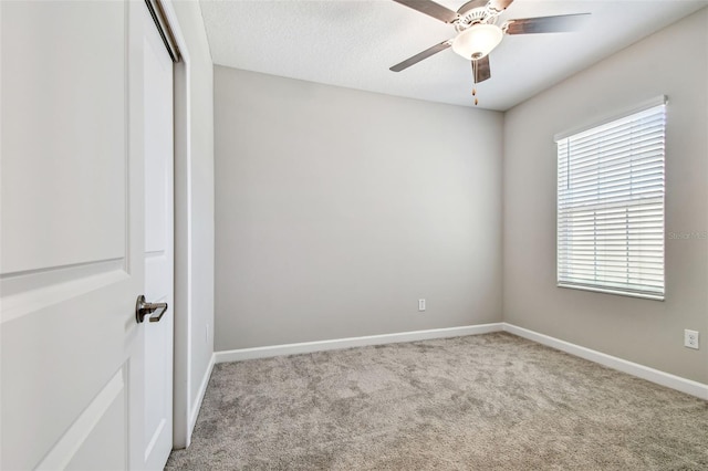 6745 Citrus Creek Ln, Tampa, FL 33625 - unfurnished room with carpet floors, baseboards, and ceiling fan