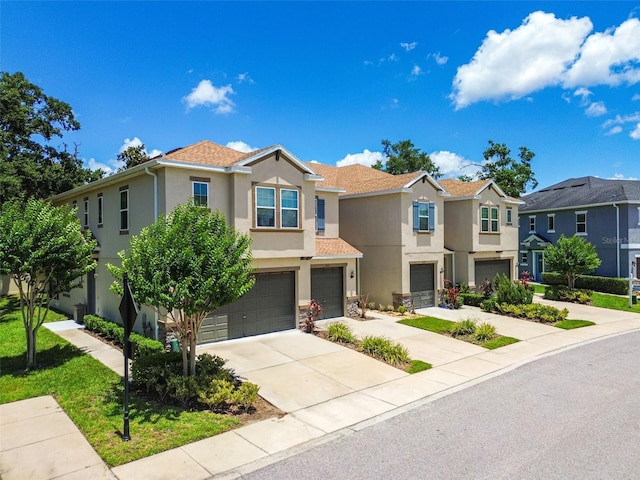 6745 Citrus Creek Ln, Tampa, FL 33625 - view of front of home featuring stucco siding, a garage, driveway, a residential view, and stone siding