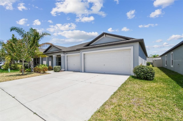 10822 Crushed Grape Dr, Riverview, FL 33578 - single story home with a garage, concrete driveway, a front yard, and stucco siding