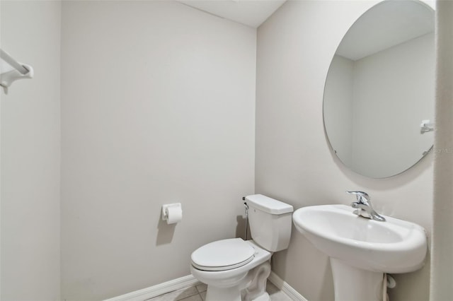 10822 Crushed Grape Dr, Riverview, FL 33578 - bathroom featuring toilet, baseboards, and tile patterned floors