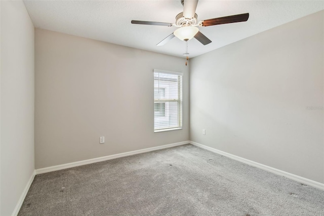 10822 Crushed Grape Dr, Riverview, FL 33578 - spare room with carpet flooring, baseboards, and ceiling fan