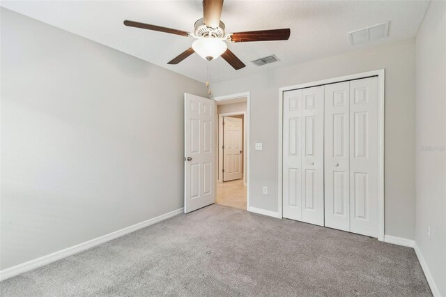 10822 Crushed Grape Dr, Riverview, FL 33578 - unfurnished bedroom featuring carpet flooring, baseboards, and a closet