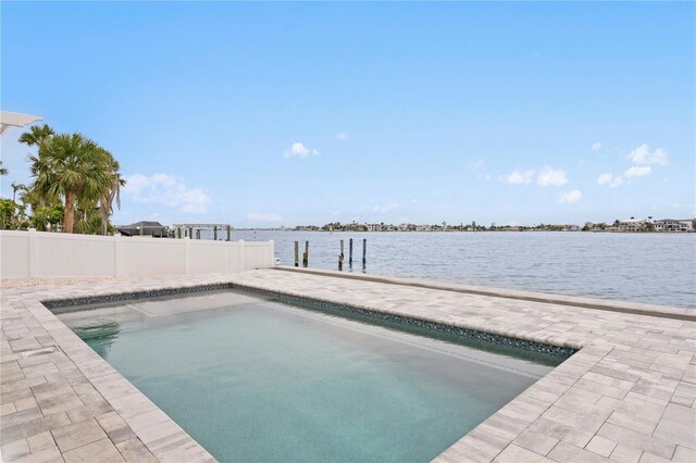 7060 S Shore Dr S, South Pasadena, FL 33707 - swimming pool with a water view and a boat dock