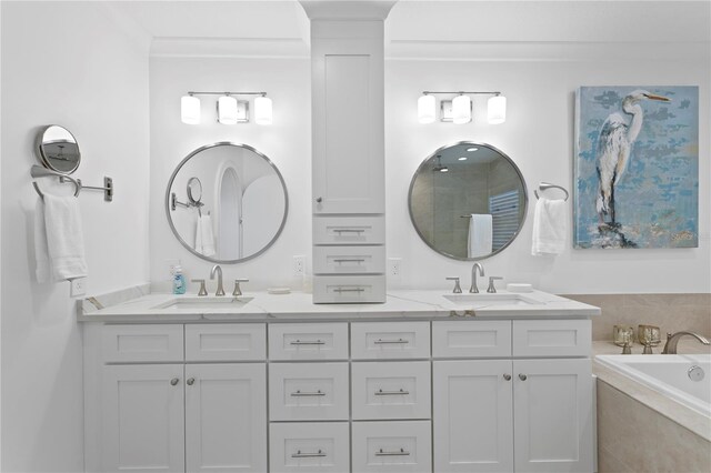 7060 S Shore Dr S, South Pasadena, FL 33707 - bathroom with a bath, double vanity, and a shower