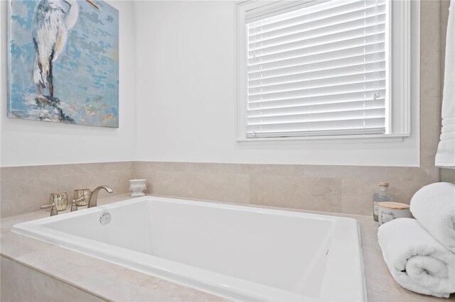 7060 S Shore Dr S, South Pasadena, FL 33707 - full bathroom featuring a garden tub and toilet