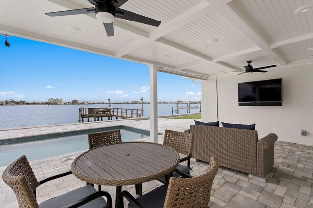 7060 S Shore Dr S, South Pasadena, FL 33707 - view of patio / terrace with a ceiling fan, an outdoor pool, and outdoor dining area