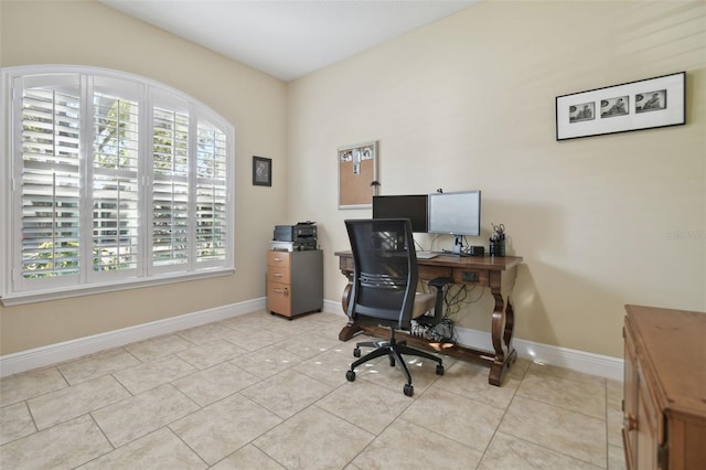 1116 Hillandale Reserve Dr, Tampa, FL 33613 - home office with tile patterned floors and baseboards