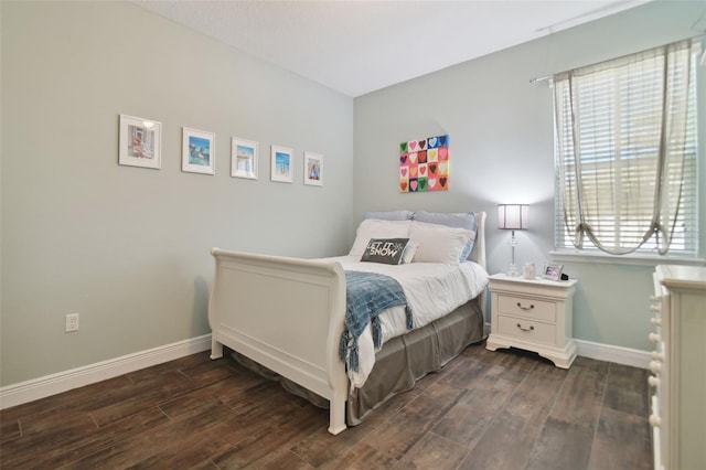 1116 Hillandale Reserve Dr, Tampa, FL 33613 - bedroom featuring dark wood finished floors and baseboards