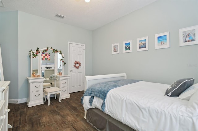 1116 Hillandale Reserve Dr, Tampa, FL 33613 - bedroom with dark wood-style flooring and baseboards