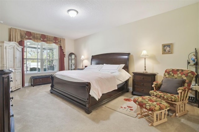 1116 Hillandale Reserve Dr, Tampa, FL 33613 - bedroom featuring light colored carpet, a textured ceiling, and baseboards