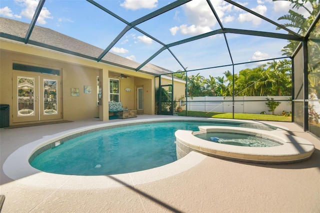 1116 Hillandale Reserve Dr, Tampa, FL 33613 - view of pool featuring a patio area, french doors, glass enclosure, and a pool with connected hot tub