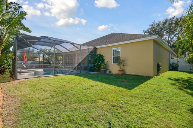 1116 Hillandale Reserve Dr, Tampa, FL 33613 - back of house featuring stucco siding and a patio