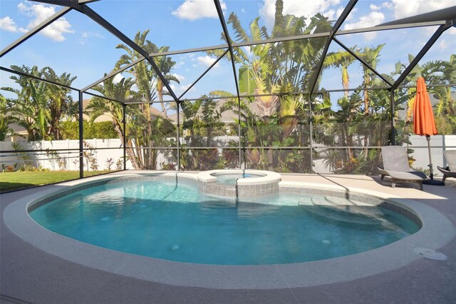 1116 Hillandale Reserve Dr, Tampa, FL 33613 - view of swimming pool with a patio, a lanai, a pool with connected hot tub, and fence