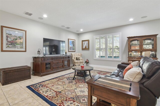 1116 Hillandale Reserve Dr, Tampa, FL 33613 - living room featuring light tile patterned floors and recessed lighting