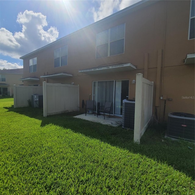 10850 Lake Saint Charles Blvd, Riverview, FL 33578 - back of house with a patio and stucco siding