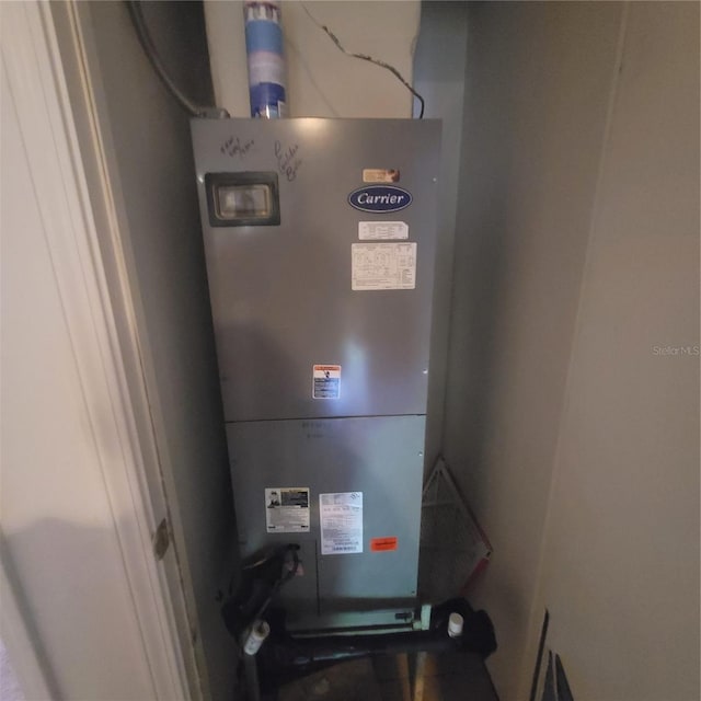 10850 Lake Saint Charles Blvd, Riverview, FL 33578 - utility room featuring heating unit