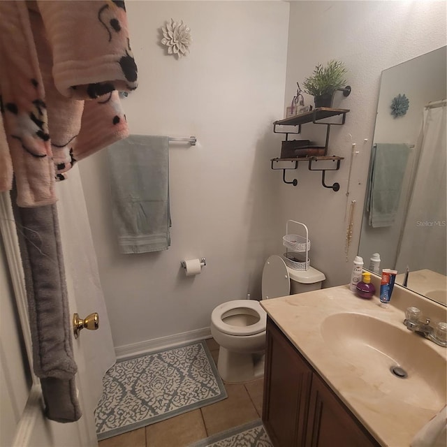 10850 Lake Saint Charles Blvd, Riverview, FL 33578 - full bathroom with vanity, tile patterned flooring, and a shower with shower curtain