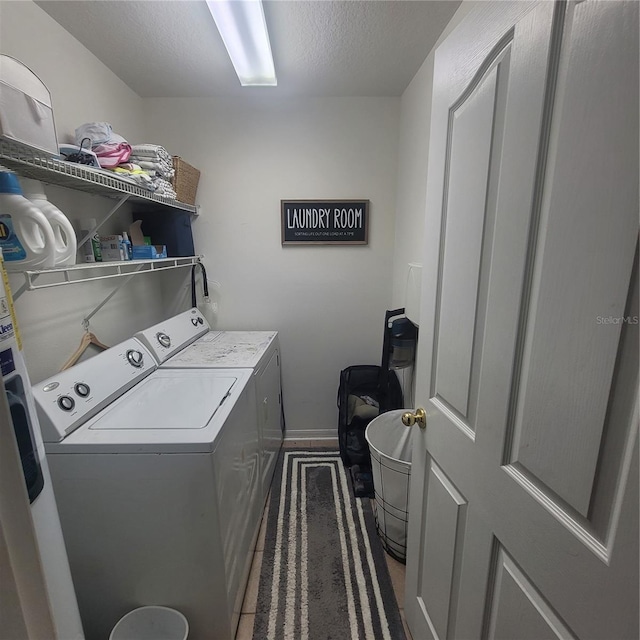 10850 Lake Saint Charles Blvd, Riverview, FL 33578 - laundry room with independent washer and dryer and a textured ceiling