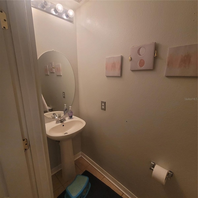10850 Lake Saint Charles Blvd, Riverview, FL 33578 - bathroom featuring tile patterned floors and a sink