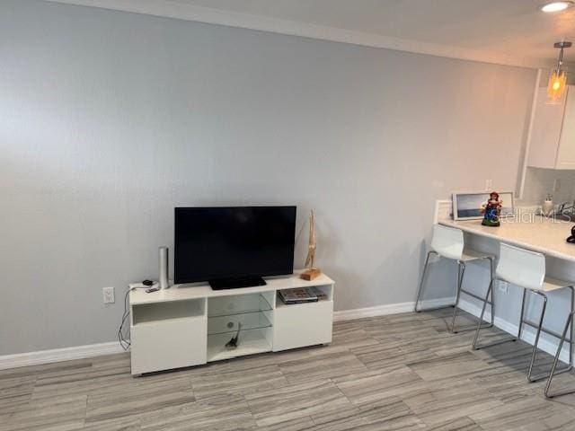 home office featuring baseboards and ornamental molding