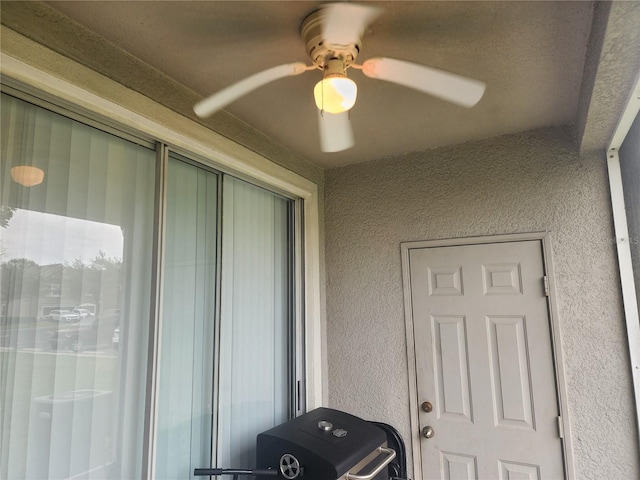 4537 Kennewick Pl Unit 4537, Riverview, FL 33578 - view of exterior entry featuring stucco siding and a ceiling fan
