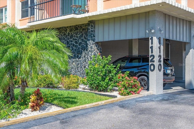 view of property with an attached carport