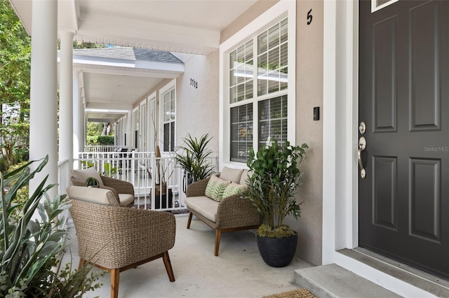 balcony featuring covered porch