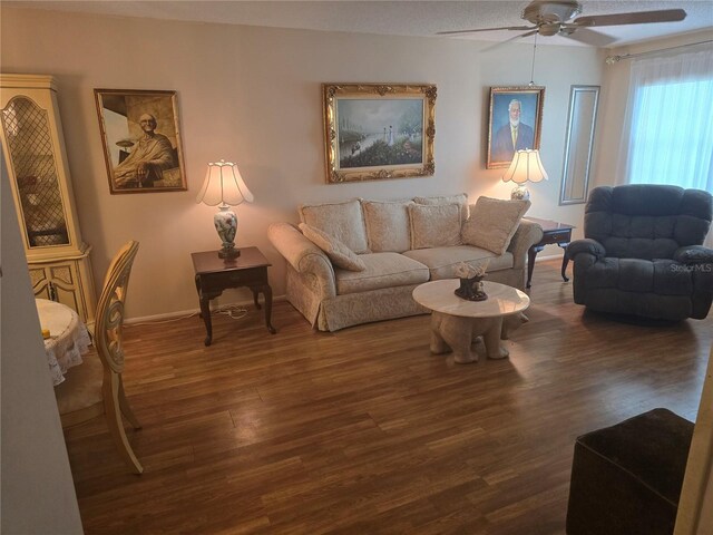 5705 80th St N Unit 303, Saint Petersburg, FL 33709 - living room with wood finished floors, ceiling fan, and baseboards