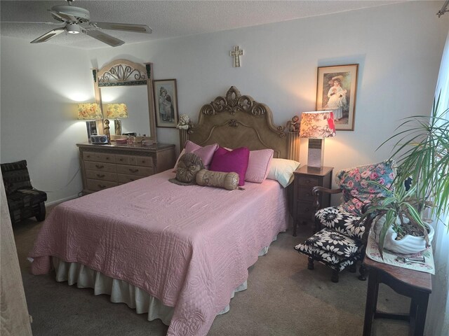 5705 80th St N Unit 303, Saint Petersburg, FL 33709 - carpeted bedroom with a textured ceiling and ceiling fan