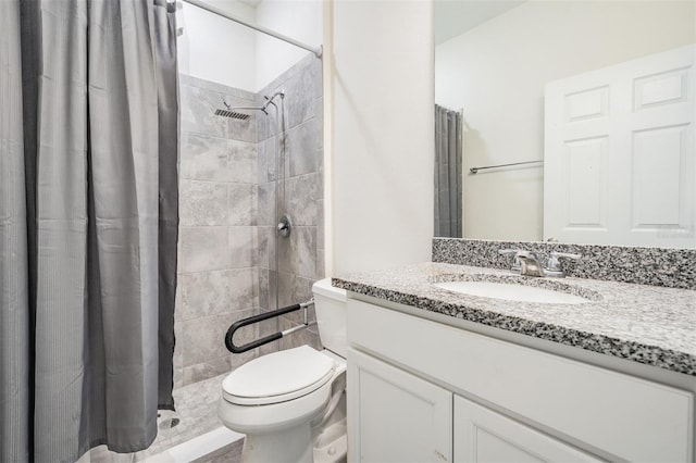 12420 Brick Cobblestone Dr, Riverview, FL 33579 - bathroom with tiled shower, toilet, and vanity