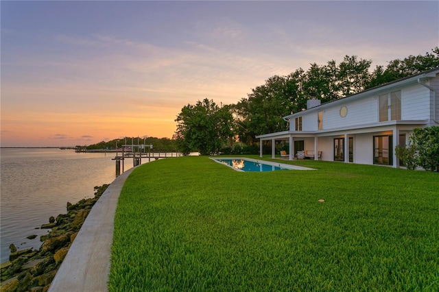 218 Colony Point Rd S, Saint Petersburg, FL 33705 - view of green lawn featuring a water view, an outdoor pool, french doors, a boat dock, and a patio area